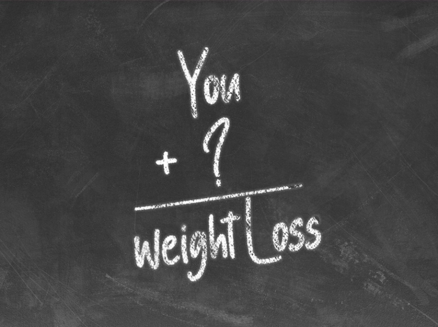 You+?=Weight Loss white text written in chalk on blackboard